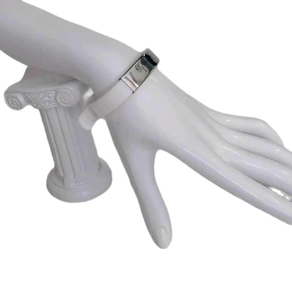White brazalete.with engraved symbols