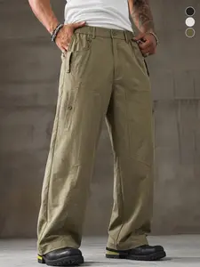 Men’s army green casual cargo pants with large buttoned pockets and an elastic waistband at the back; comfortable and versatile, suitable for casual and streetwear looks.