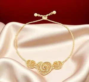 14K Gold-Tone Plated Adjustable Filigree Bracelet with Spiral Hearts
