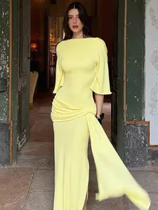 Sexy Elegant Asymmetric Low-Cut Open-Back Light Yellow. Twist-Tie Streamer Low-Rise Slim Long Dress. Elbow-Length Batwing Sleeve Oversized Minimalist Niche Resort Party Dress.