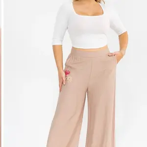 High-Waisted Wide-Leg Pants with Embroidered Floral Detail in Soft Beige for Women