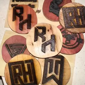 Custom wooden golf ball markers
