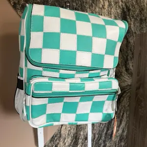 Turquoise Checkered Backpack - Stylish Checker Pattern for Everyday Use