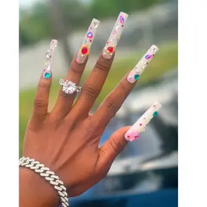 Long milky white press on nails with multicolor rhinestones (10 nails included)