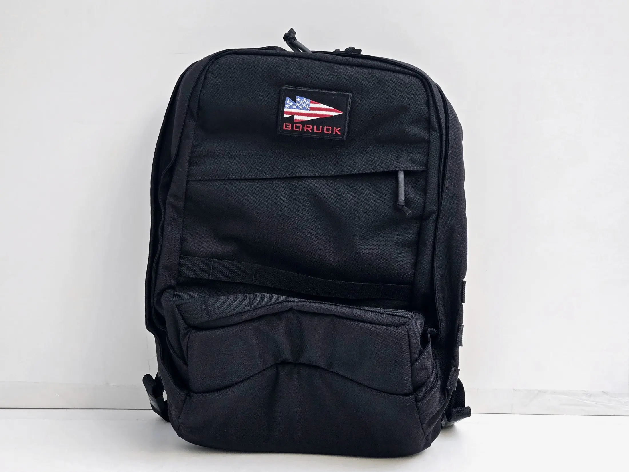 Goruck Black Backpack with American Flag Patch and Multiple Pockets for Everyday Use