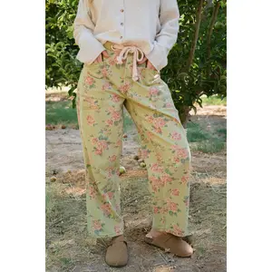 THE CHARLI FLORAL PRINT PANTS IN OLIVE