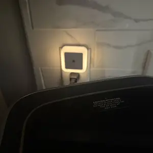 Customer photo of plug-in night light in bathroom