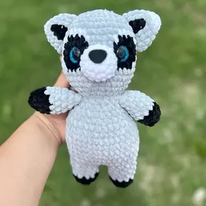 crocheted raccoon