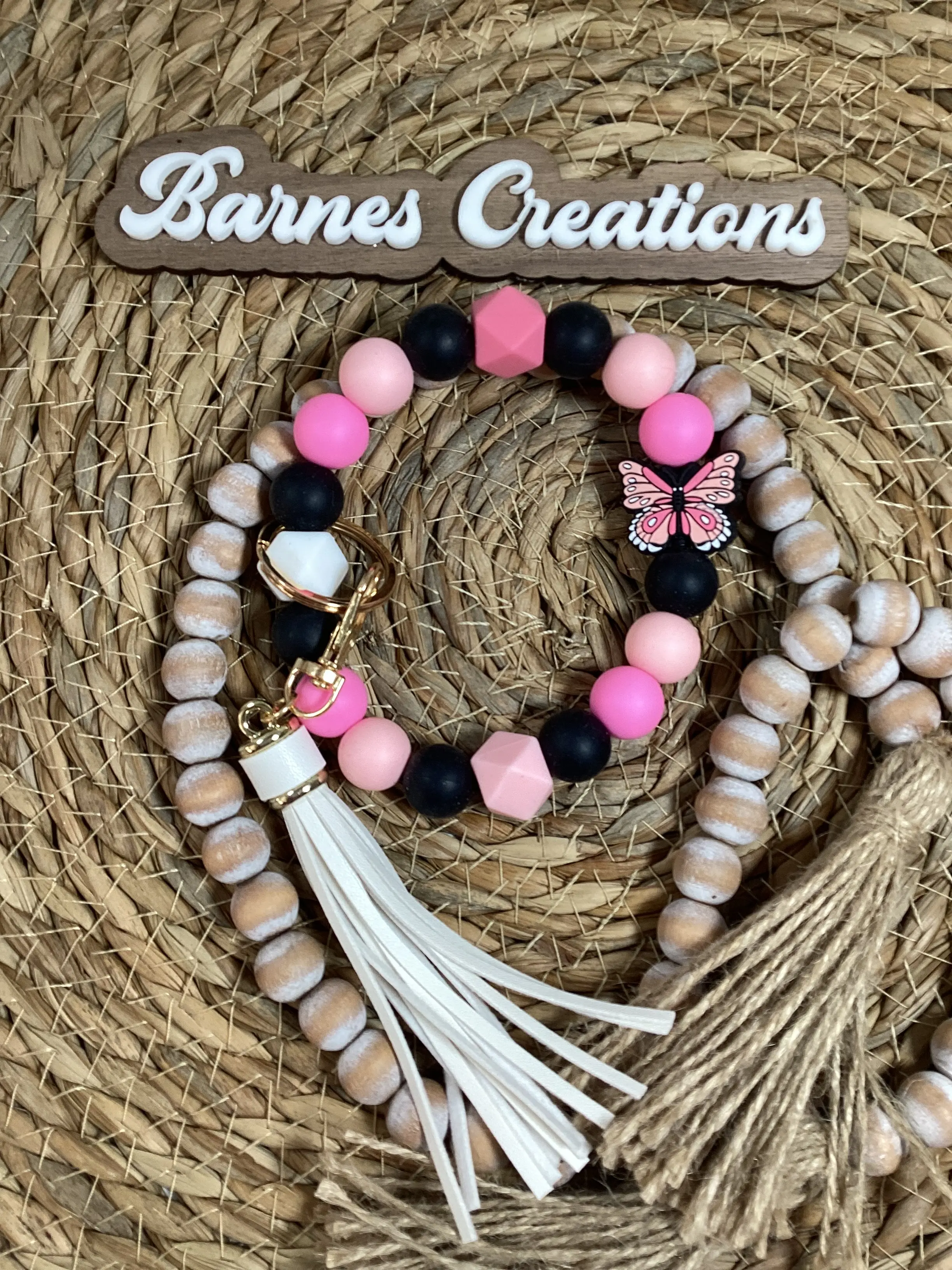 Wristlet butterfly with black and pink silicone beads