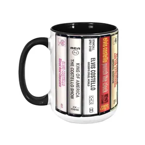 [SALE UP TO 51%] Elvis Costello Cassette Tape Mug, Retro Album Spines Coffee Cup, New Wave Punk Fan Gift, Songwriter Decor