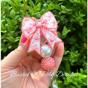 Bushel & Peck Designs Coral Coquette Bow Badge Reel Medical 2.0" Acrylic Blank Hand Glittered Epoxy Retractable Clip-on Accessory