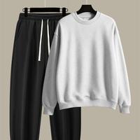 Black pants light gray sweater