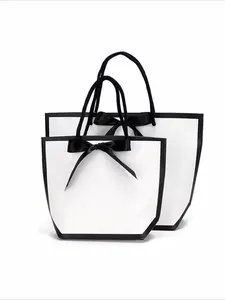 Wholesale Pack of 10 Stylish Art Paper Shopping Bags Portable Bag Custom Laminated Kraft Paper with Handles for Clothing Store Packaging