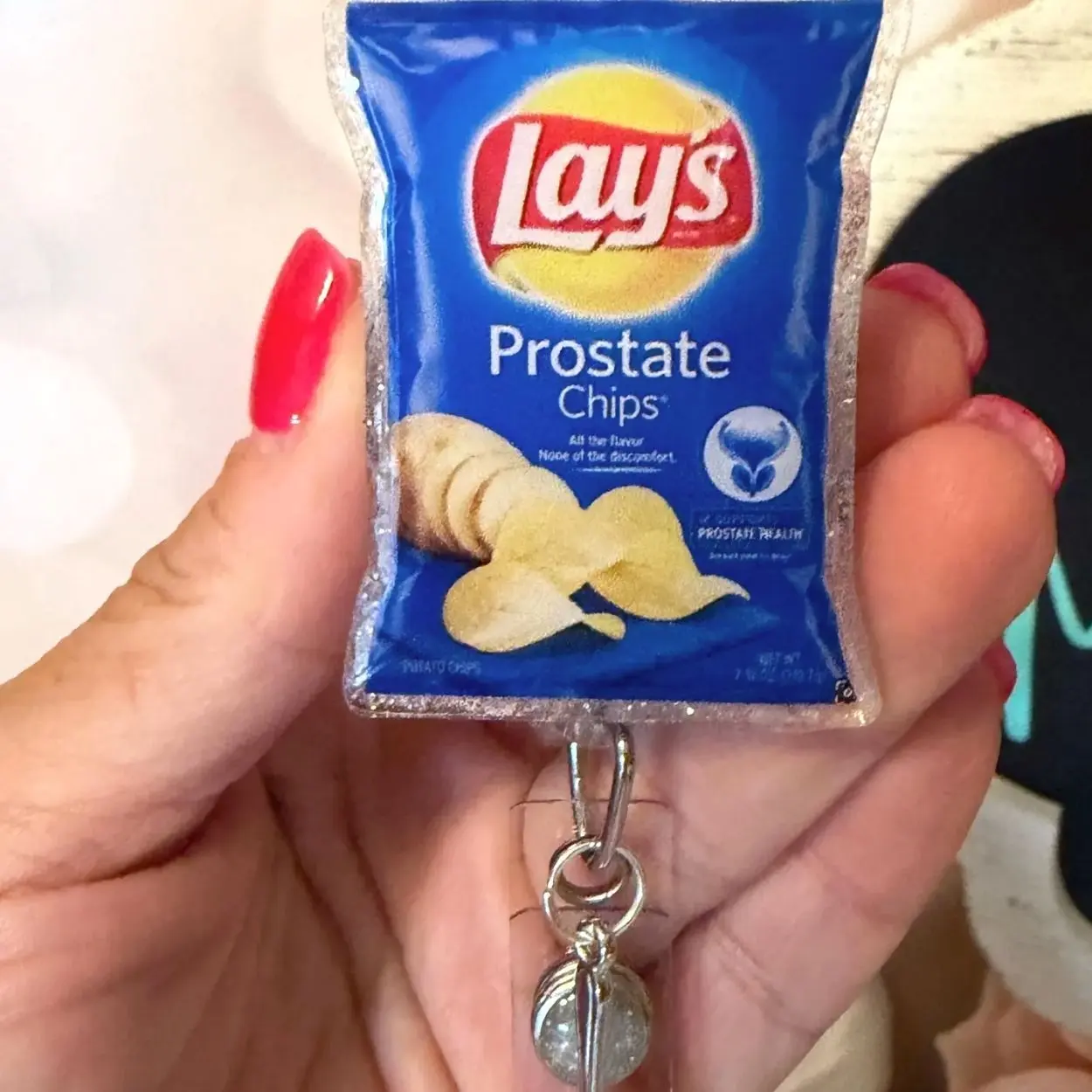 Bag of Prostate Chips w/spoon charm Badge Reel