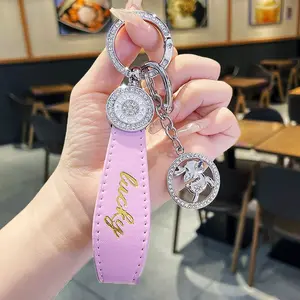 Cute Instagram influencer keychain pendant, bracelet, creative four-leaf clover women's style diamond-encrusted key chain pendant