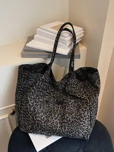 Retro light luxury texture leopard print canvas tote bag, classic leopard print, large capacity exquisite personalized shoulder bag, front patch pocket, wide shoulder strap, suitable for commuting/going out/traveling, Stylish Versatile Bag