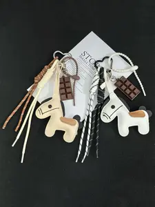 Cute Little Pony Pu Keychain, Ins-Style Simple And Adorable, Paired With A Chocolate Charm, Woven Lanyard, Suitable For Keys, Bag Decoration, And A Nice Accessory For Commuting Or Dating