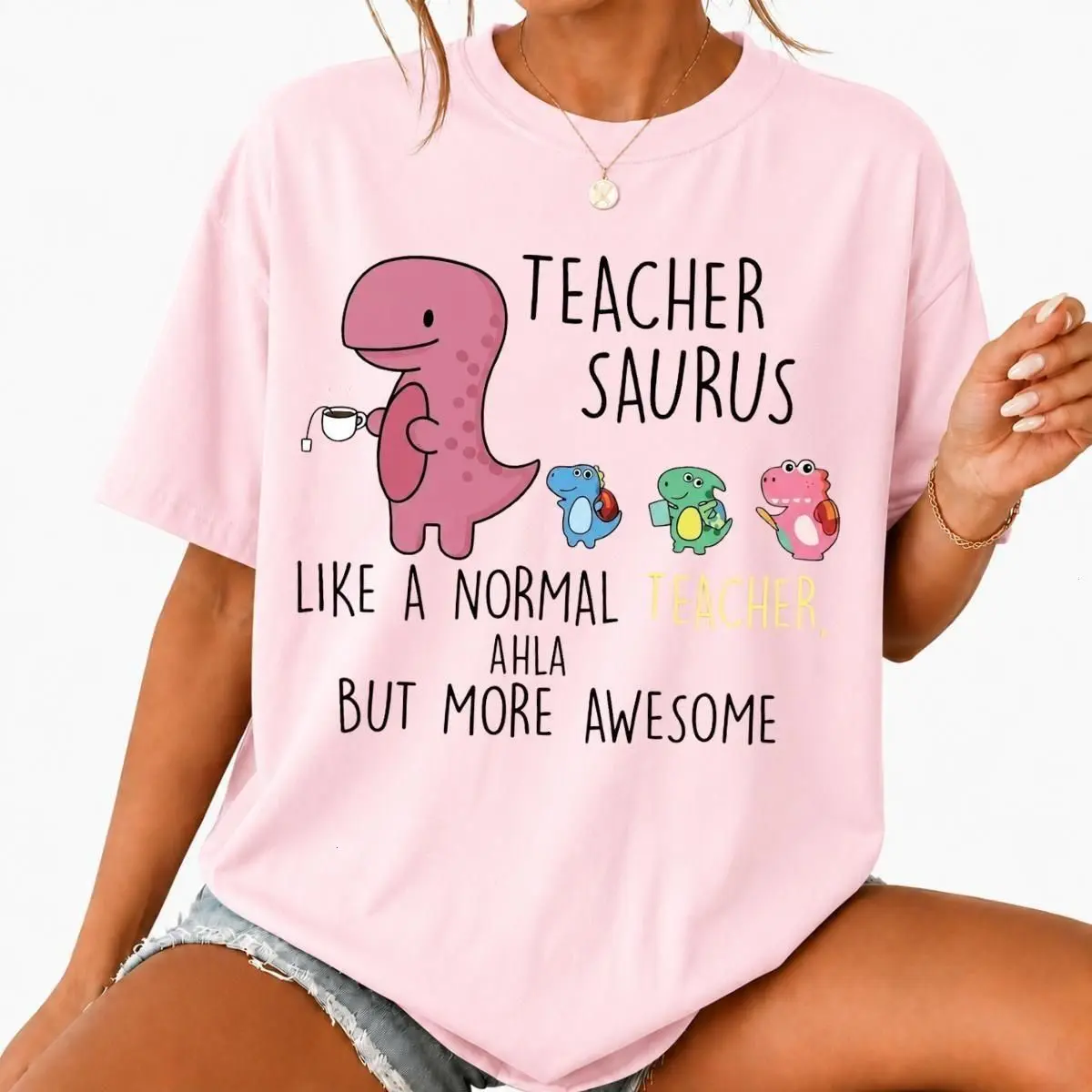 Teacher Saurus Cute Dinosaur Graphic T-Shirt, Funny Back To School Educator Tee, Humorous Teacher Apparel, Front Chest Print Top, Delightful Novelty Gift For Women And Girls Who Love Teaching And School Life