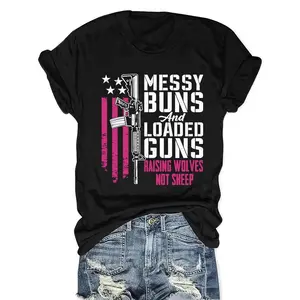 Women's Patriotic "Messy Buns & Loaded Guns" Graphic T-Shirt - American Flag & Rifle Design, Raising Wolves Not Sheep Slogan, Black with Pink/White Lettering, Casual Crew Neck Short Sleeve Top, Machine Washable, Gun Tee Shirts, Summer Top, Bold Statement