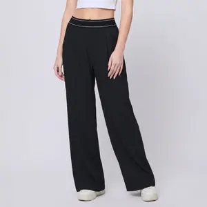 Women's Wide-Leg Pants — Yoga Style. Featuring front pleats, a relaxed elastic waistband, and a straight-leg cut with pockets. Crafted from soft, comfortable fabric in classic black, these pants are versatile and perfect for casual wear
