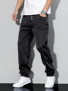 Men's deep gray slim-fit straight-leg jeans, trendy street style. The jeans are made of breathable and soft fabric with a comfortable fit, suitable as men's lower wear for daily wear, parties, and street fashion. Streetwear Fitted Pants