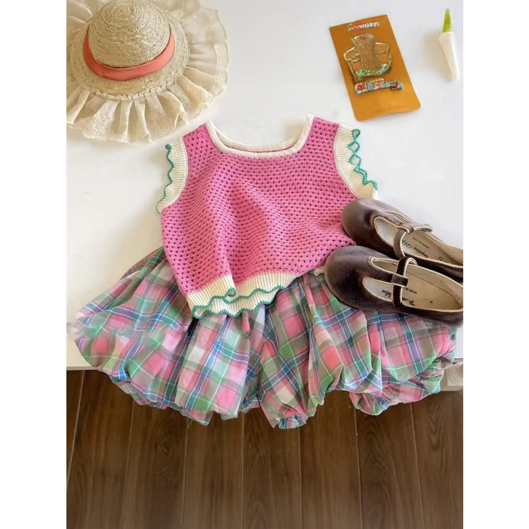 A Sweet Summer Set for Girls: a Pink Hollowed-out Knitted Vest and a Checked Flower Bud Skirt.It's a 2pcs Children's Casual and Comfortable Vacation Set, Perfect for Outdoor