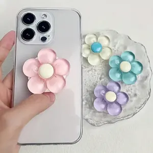 Transparent and adorable flower-shaped resin phone holder, with a foldable design, compatible with smartphones, suitable as a gift and for daily use
