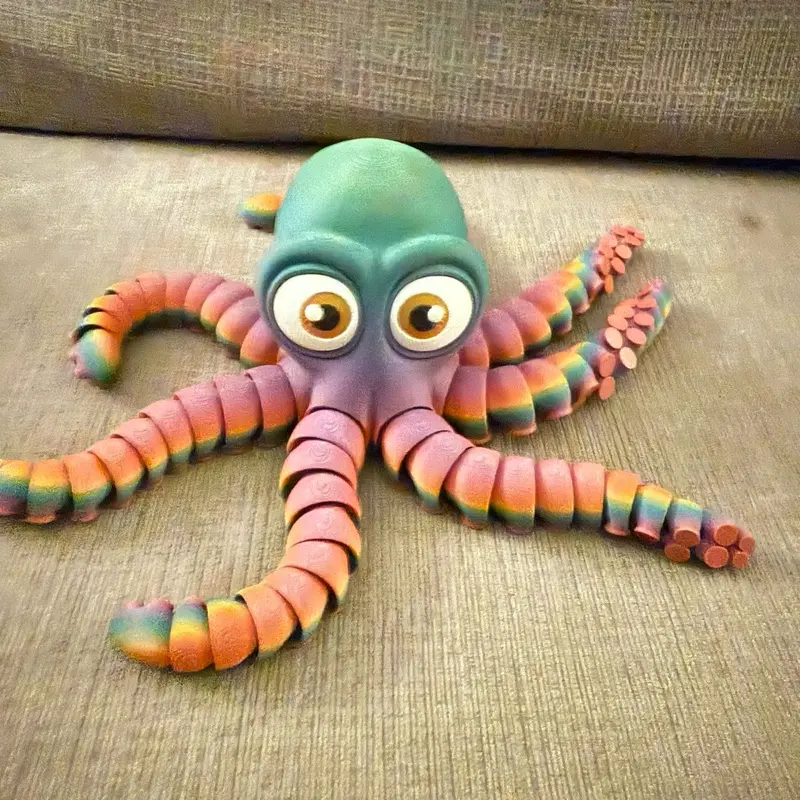 Cute Articulated Octopus Toon 3D Original Poseable Fidget Toy with Vibrant Rainbow Tentacles and Expressive Eyes