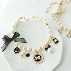 Catwalk to Real Walk! 🌟     Pearl-Encrusted Safety Collar Set 🔔     Hypoallergenic Kitten Necklace (0.5-3lbs) 🎀     4 Luxury Styles: Rose Gold/Silver/Champerse/Pink ✨