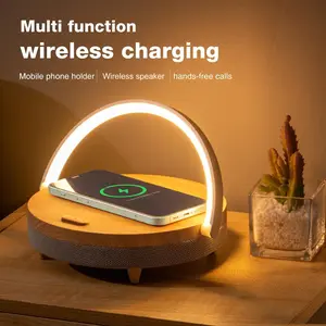4-in-1 Wireless Charging Station with Bluetooth Speaker & Night Light - Fast 15W Qi Cradle Charger, Sleek Wood Grain Stand, Auto Safety Shut-Off. Perfect Desk Organizer & Gift for Bedroom, Office, or Dorm.