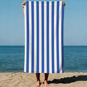 Vertical blue and white stripes: Consistent pattern, graphic design style. Sand-Free Beach Towel | Ultra-Light Microfiber | Quick-Dry, Compact for Travel