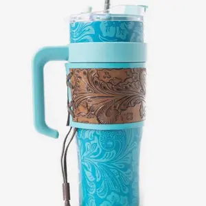 Wide Wyoming Tumbler with Blue Floral Design and Brown Leather Wrap for Stylish Drinkware