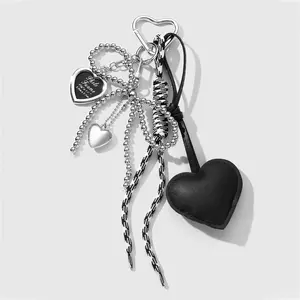 1 piece INS creative fashion retro unique sweet‑cool high‑end silver handmade beaded charm with CCB bow, multicolor leather heart frame, handmade braided climbing rope DIY keychain accessory and bag pendant; suitable for girls/women/sisters/best friends f