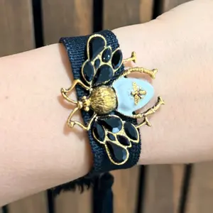 Beautiful bee bracelets that represent feminine strength.