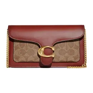 Coach Tabby 20 Classic Monogram Handbag with Metal C Logo, Chain Strap, and Snap Closure – Small Crossbody Bag for Women in Brown and Rust