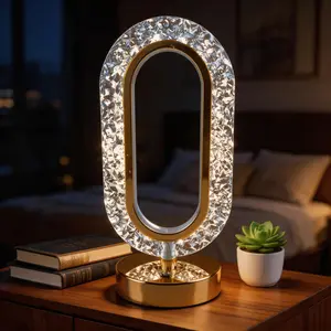 Gold-rimmed crystal ring USB ambient night light featuring three-level dimming. This atmospheric LED light is perfect for bedside tables, desks, bookshelves, patios, or vacation rentals, serving as both a reading light and a great gift option.