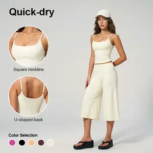 Women’s two-piece set made from quick-dry fabric featuring wide-leg capris—casual outfit suitable for leisure, yoga, sports, and fitness.