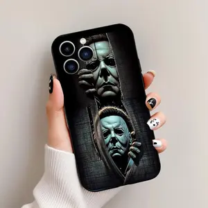 Check Out This Black Iphone Case Featuring Michael Myers. Crafted from TPU Material, It Is Soft, Gentle on The Skin, Adorable, And Makes a Perfect Gift for Friends! Compatible with Iphone 11 12 13 14 15 16 Pro Max.QXF310.designer,case Protective Cover