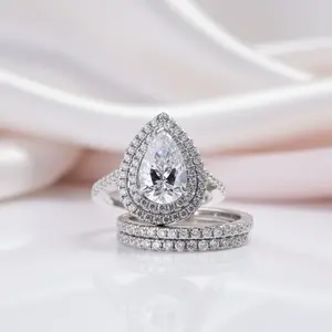 Double Halo Pear Cut 3-Pieces Wedding Set