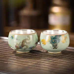 Handcrafted Silver-Glazed Celadon Dragon-And-Phoenix Twin Cups with Kiln-Change Effect Traditional Porcelain Gongfu Tea Set for Tea Tasting Cups