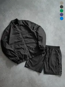 Men’s casual sports set for spring and autumn, fashionable two-piece design with a minimalist loose fit for outdoor wear. Includes a zip jacket/outer layer and shorts. Polyester fabric that is quick-drying, breathable, sun-protective, and comfortable—idea