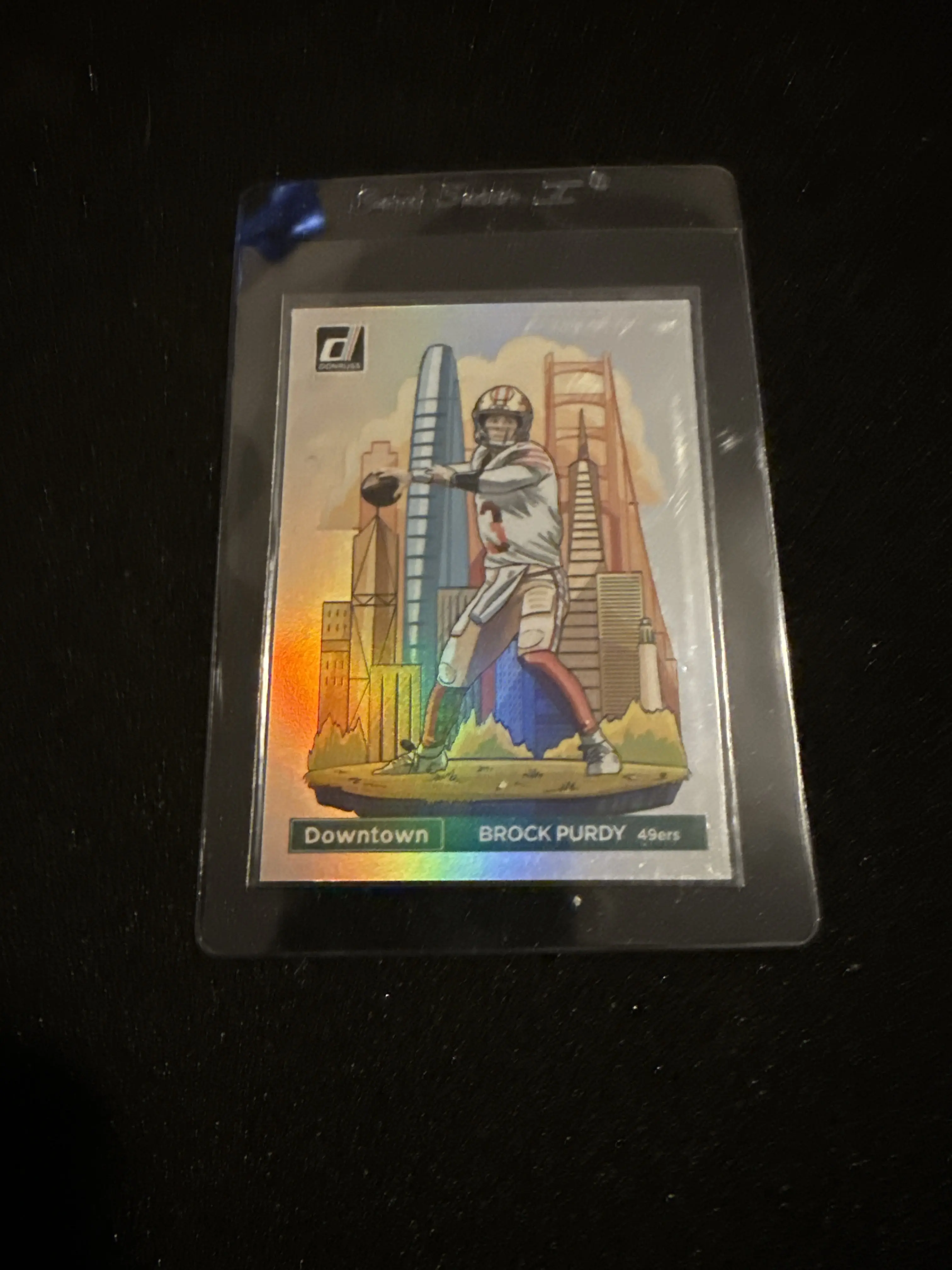 Panini 2024 Donruss Brock Purdy 49ers Downtown Trading Card Collectible - Official NFL Trading Card