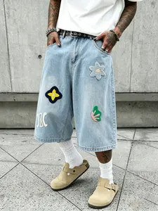 Men’s 3/4 loose denim shorts, hip-hop street style, chenille patch appliqué, wide-leg denim shorts, vintage black wash, over-the-knee length, casual skate shorts, unisex denim apparel.