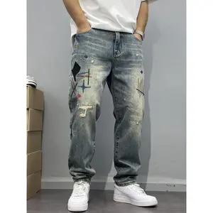 Men’s washed vintage distressed patchwork embroidered tapered straight-leg high street casual ripped stacked denim jeans