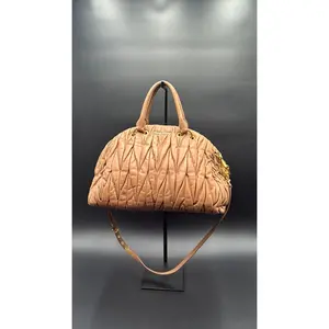 Pre-owned Leather Luxury Bags & Accessories Miu Miu Matelasse Bowling Bag, Light Brown Date Code: NODC06162609. Entrupy ID: .