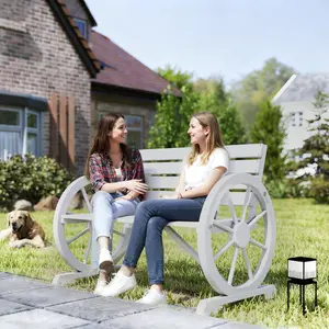 Outdoor slatted wooden bench with wagon wheel armrest classic rustic charm comfortable two person seating for home exterior use