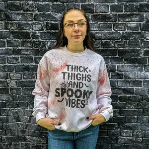 Thick Thighs And Spooky Vibes Blood Splatter Halloween Unisex Crew Neck Tie Dye Sweatshirt