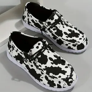 Comfortable flat shoes for women with a cow pattern, lightweight design, available in sizes 36–45, suitable for all seasons—ideal for parties and everyday wear—with adjustable laces; casual sports shoes.