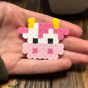 Cow keychains made from perler beads