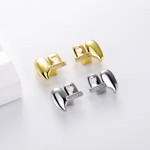 New best-selling trend micro-inlaid zircon tiger teeth left and right symmetrical fangs set Halloween funny braces cool trend rap jewelry.